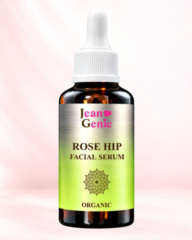 Jean Genie Organic Rosehip Facial Oil in an amber glass bottle with a white dropper and green label.